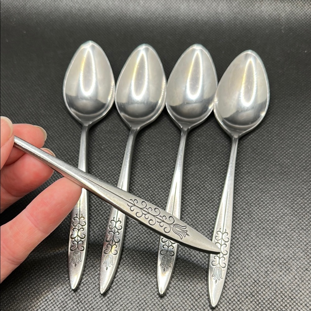 Ornate Silver Flatware Spoon Set